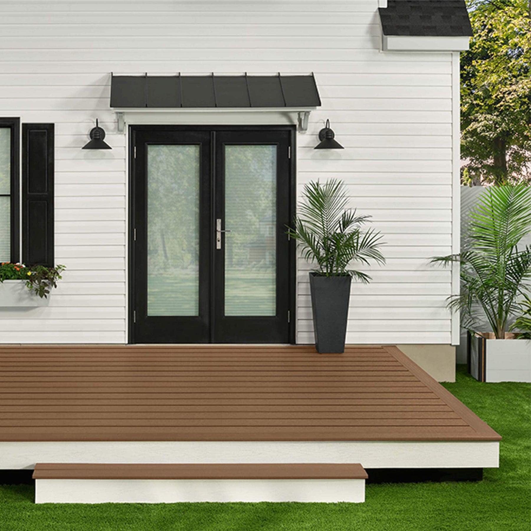 Saddle grooved-edge composite decking board installed on a deck