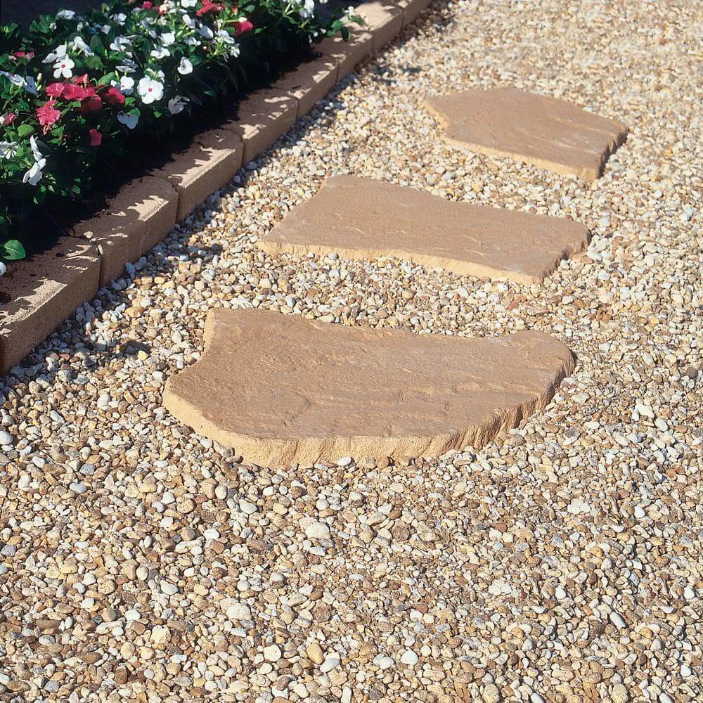 Pea gravel landscape rock bag used in a garden bed