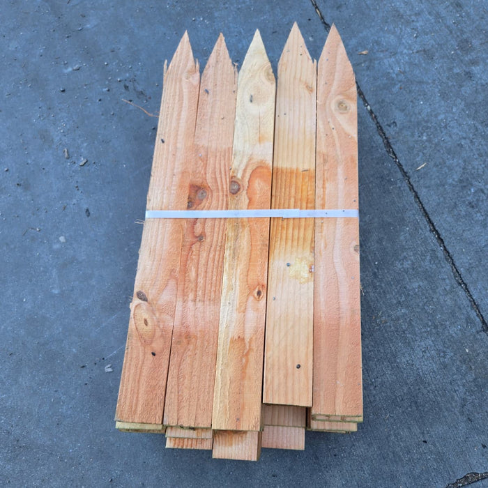 Stake 1 in. x 3 in. x 24 in. Douglas Fir (50-Pack) stacked wood stakes with chiseled points.