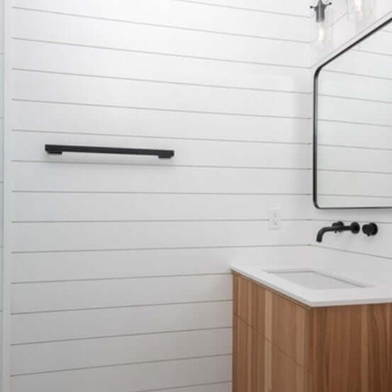 MDF Shiplap 5/8 in. x 6 in. x 16 ft. Primed 2010LDF used in modern bathroom interior design.