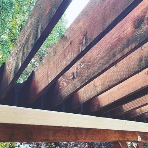 Pressure Treated Lumber 2 in. x 8 in. x 20 ft. Brown Stain, GC, HF