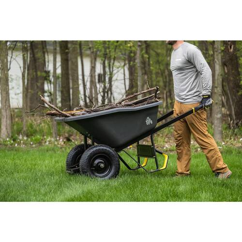 Wheelbarrow Dual-Wheel Pro-Grade Poly Bucket Steel Handles Dual 16 in. Pneumatic Wheels Easy-Dump Design 8 cu. ft.